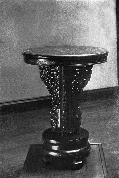 Figure 21. CARVED CEDAR TABLE.